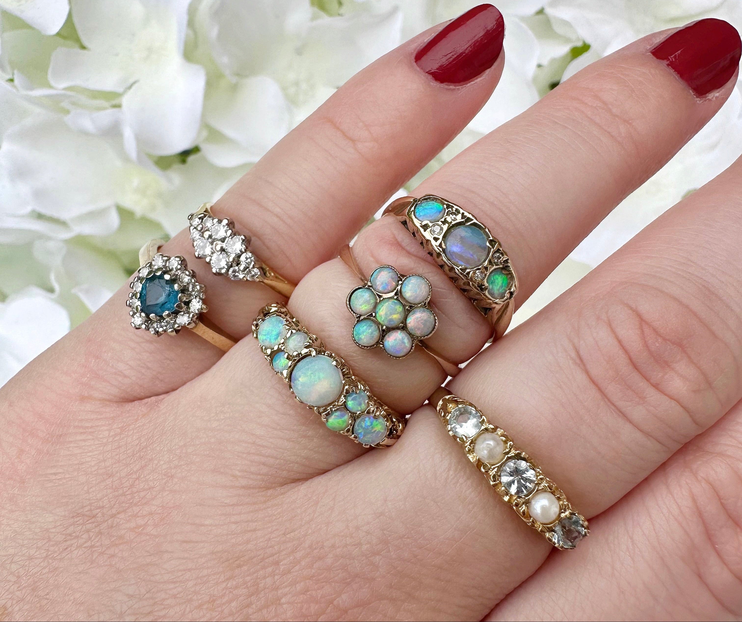 Dainty vintage and antique gold opal and topaz rings 